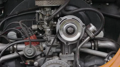 Close-up of a vintage car engine with visible parts and mechanics Stock Footage 331247057