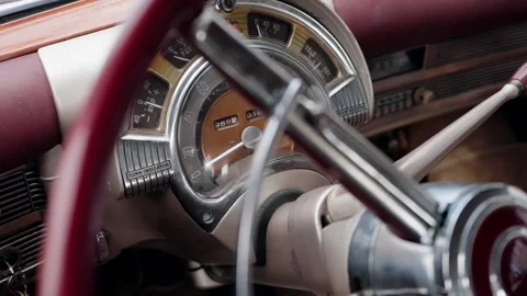 Close up of vintage car speedometer and steering wheel interior Stock Footage 306034875