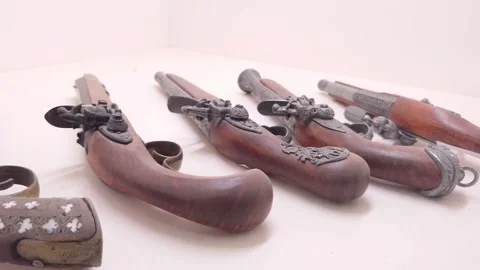 Close-Up of Vintage Flintlock Pistols Stock Footage 334136348