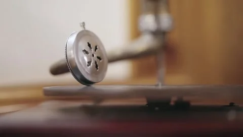 Close-up of a vintage gramophone needle in a rustic setting Stock Footage 314654001