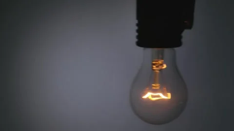 Close up of Vintage Light Bulb on Gray Background 스톡 동영상 329763419