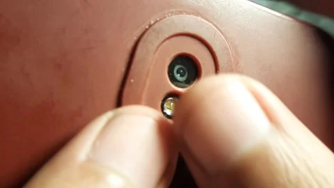 Close Up of Vintage Mobile Phone Single Camera Lens and Flash Stock Footage 341370992
