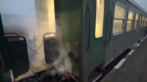 Close up vintage old steam train standing on track in station. Stock Footage 320896276