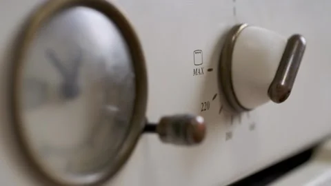 Close Up of Vintage Oven Knob Setting Temperature in Retro Kitchen Stock-Footage 339069460