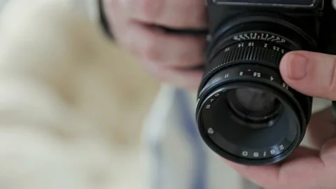 Close-up vintage photo camera details, setting up the film camera. Stock Footage 168384953