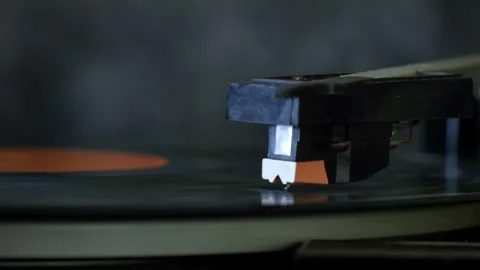 Close-up of a vintage record player needle playing a vinyl record Stock Footage 300793137