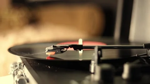 Close-up of a vintage record player needle playing a vinyl disc Stock Footage 337104460