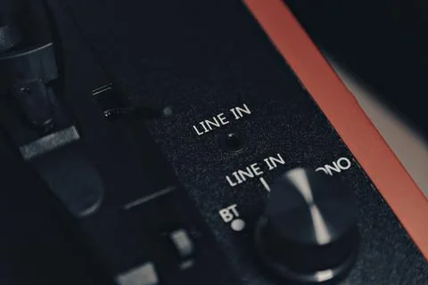 Close-up, vintage record player, While playing the record, Black platter. Stock Photos