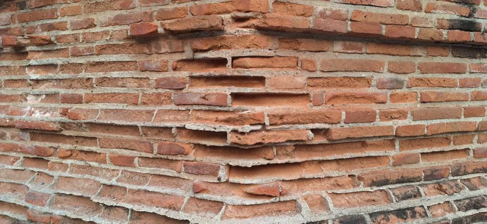 Close up of vintage red brick pattern wall background with old mortar Stock Photos