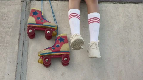 Close-up of vintage rollers and legs of a teenage girl. Stock Footage 251915641