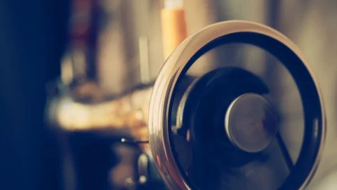 Close up of vintage sewing machine. Retro style sewing tinted footage. Stock Footage 87911263