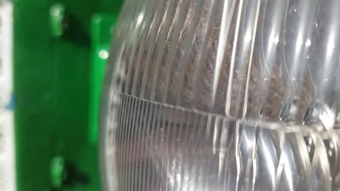 Close up of a vintage tractor headlight with H4 bulb marking Vídeos de archivo 333642898