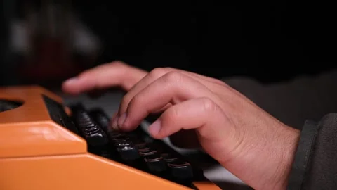 Close-up of a Vintage Typewriter Typing a Document Stock Footage 320873298