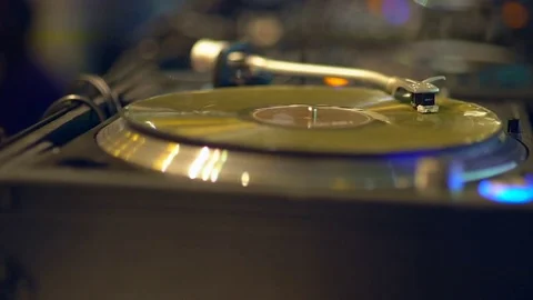 Close up of vinyl disk on the modern turntable. Blured background. Stock-Footage 82710032