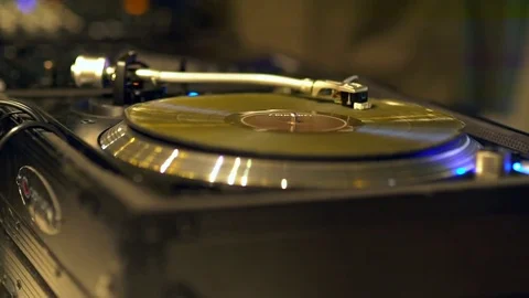 Close up of vinyl disk on the modern turntable. Blured background. Stock-Footage 82710085