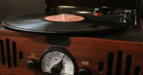 Close up of vinyl record on DJ turntable record player Stock Footage 85856386
