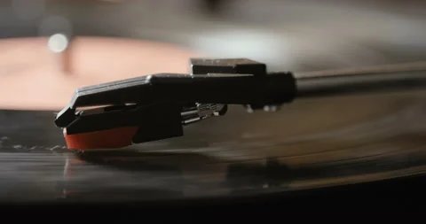 Close up of vinyl record on DJ turntable record player Stock Footage 85860324