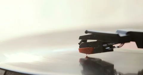 Close up of vinyl record on DJ turntable record player Stock Footage 85865364