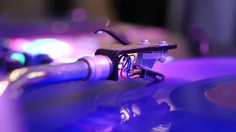 Close up of vinyl Record Needle on turntable during Dance rave Party at DJ Booth Stock Footage 145833848