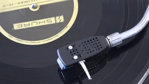 Close-Up of Vinyl Record Playing on Turntable Needle Arm, with various arm m Stock Footage 293085759