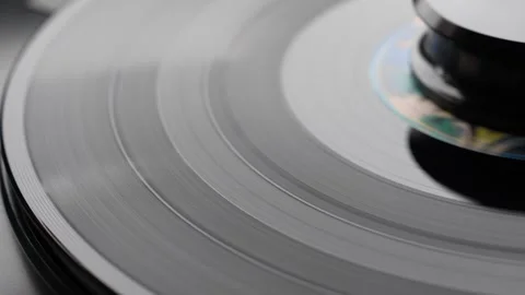 Close-Up of Vinyl Record Playing on Turntable Stock Footage 333756762