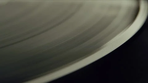 Close Up of Vinyl Record Playing on Turntable in Sunlight Stock Footage 345396207