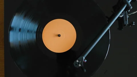 Close up of vinyl record spinning on turntable Stock-Footage 331312245