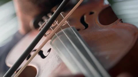 Close-up of the violinist, playing the violin, the concept of the music. Video stock 228732858