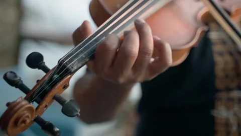 Close-up of the violinist, playing the violin, the concept of the music. Video stock 228732905