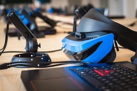 Close up of virtual reality (VR) gear set - headset, controller and computer. Ga Stock Photos
