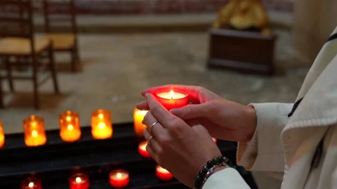 Close Up Visitor Holding Devotional Candle, Royal Chapel Versailles France Stock Footage 337053778
