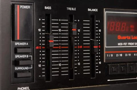 Close-up of volume and tone controls on an audio amplifier. Stock Photos