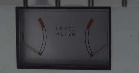 Close up of a volume meter rotating slightly reveal a light reflection on its 스톡 동영상 121188695