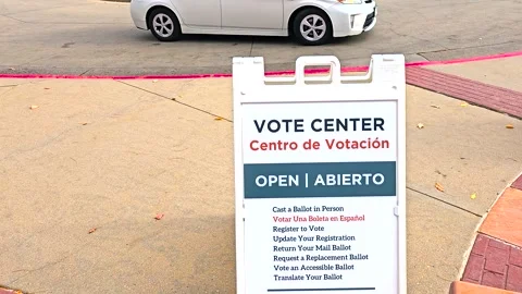 Close-Up of Vote Center / Centro de Votación Open Sign with Spanish Translation Vídeos de archivo 315641108