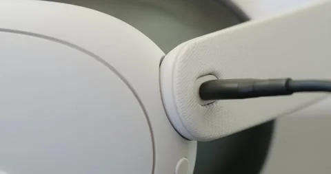 Close-up of VR Headset charging from usb cable. Stock Footage 254811578