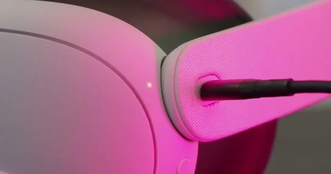 Close-up of VR Headset charging from usb cable during RGB light changing. Stock Footage 254811970