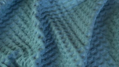 Close-up of the Waffle Cotton Texture of the Blue Plaid Fabric of the Bedspread. Stock Footage 136178954