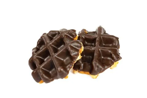 Close up of waffles with chocolates on a white background Stock Photos