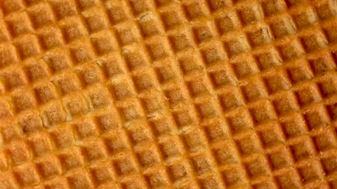 Close-up waffles move in a circular rotation. Stock Footage 143535231
