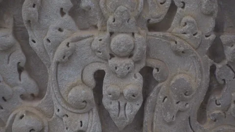 Close up wall carvings tilt down Видео 226874114