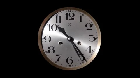 Close up a wall clock arrow showing hour and minute hand moving clockwise r.. Stock Footage 272761030