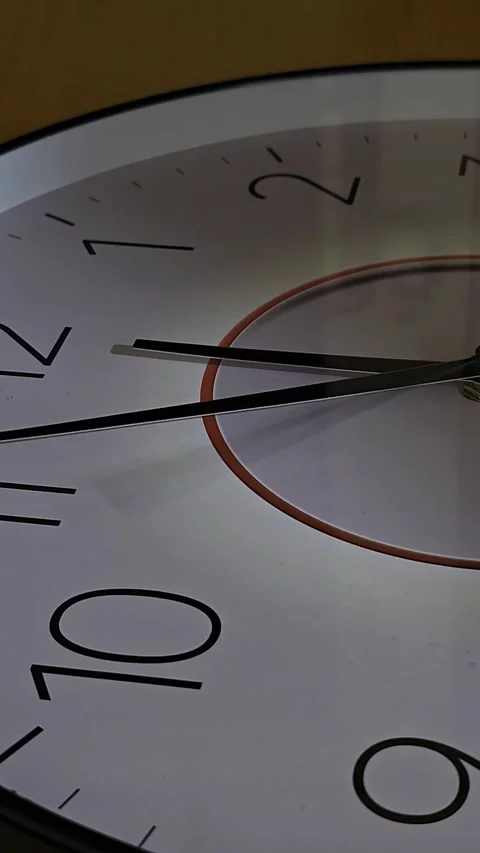 Close-Up of Wall Clock Hands Spinning Rapidly Stock Footage 334609024