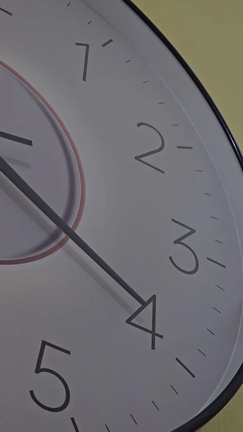 Close-Up of Wall Clock Hands Spinning Rapidly Stock Footage 334609025