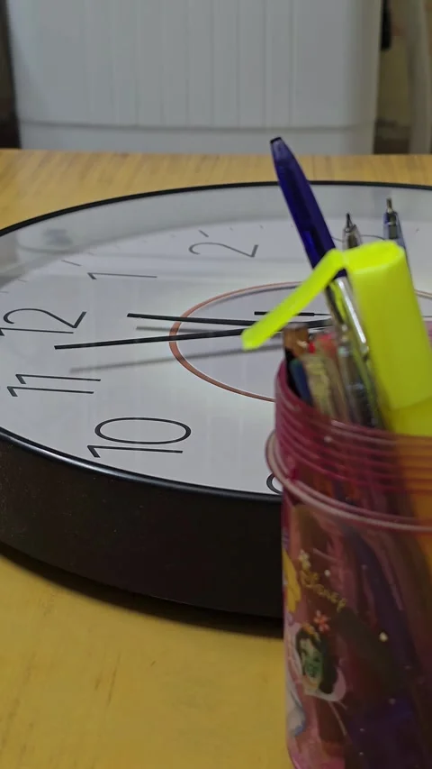 Close-Up of Wall Clock Hands Spinning Rapidly Stock Footage 334609027