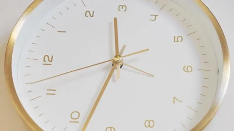 Close to a wall clock with a rotating time hand. Wall clocks show the working Stock Footage 219884878