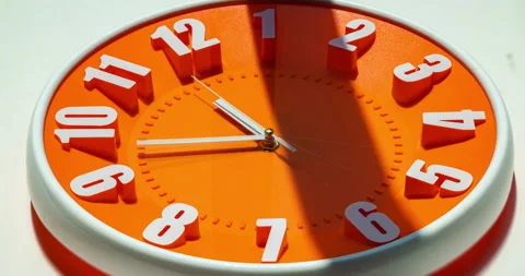Close up to a wall clock, with running time pointer. Sun and sky reflecting Video stock 152577265