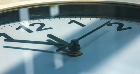 Close up to a wall clock, with running time pointer. Video stock 159735711