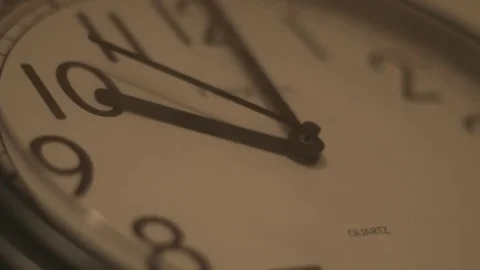 Close Up Wall Clock Ticking Handheld Shot Depth Of Field Stock-Footage 72878914