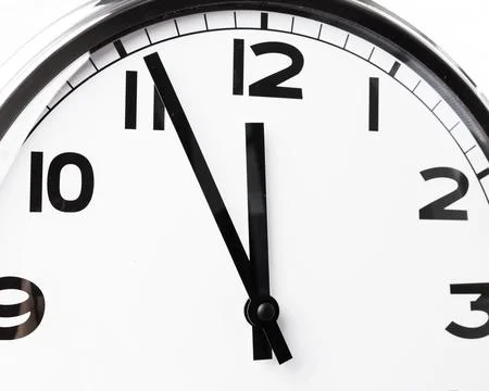 Close up of a wall clock. Time management concept Stockfoto's