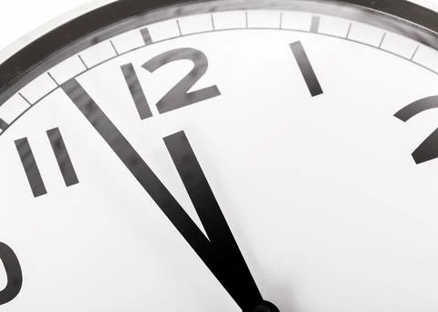 Close up of a wall clock. Time management concept Stock Photos